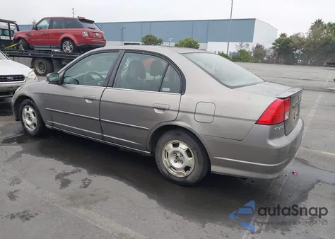 2004 Honda Civic Hybrid from USA, damaged, VIN JHMES96664S018981